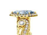 Yellow gold Fancy Blue Marquise Cut Halo Diamond Ring with Milgrain and Bezel Accents on a Split Shank Band_18