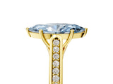 Yellow gold Fancy Blue Marquise Cut Solitaire Cathedral Diamond Engagement Ring with Channel-Set Band and Four-Prong Setting_8