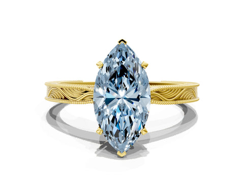 Yellow gold Fancy Blue Marquise Cut Solitaire Milgrain Engraved Band with Four-Prong Setting
