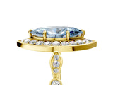 Yellow gold Fancy Blue Marquise  Halo Diamond Engagement Ring with Twisted Band and Four-Prong Setting