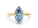 Yellow gold Fancy Blue Marquise  Solitaire Diamond Ring with a Classic Band and Four-Prong Setting