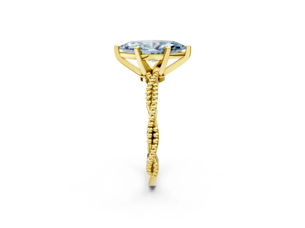 Yellow gold Fancy Blue Marquise  Solitaire Twisted Band with Bead Prong Setting