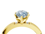 Yellow gold Fancy Blue Marquise  Solitaire with Pavé Band and Four-Prong Setting_348