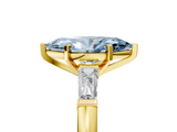 Yellow gold Fancy Blue Marquise  Solitaire with Tapered Baguette Side Stones on a Classic Band with Four-Prong Setting_98
