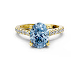 Yellow gold Fancy Blue Oval  Brilliant Diamond Solitaire with Pavé Band and Four-Prong Setting 1