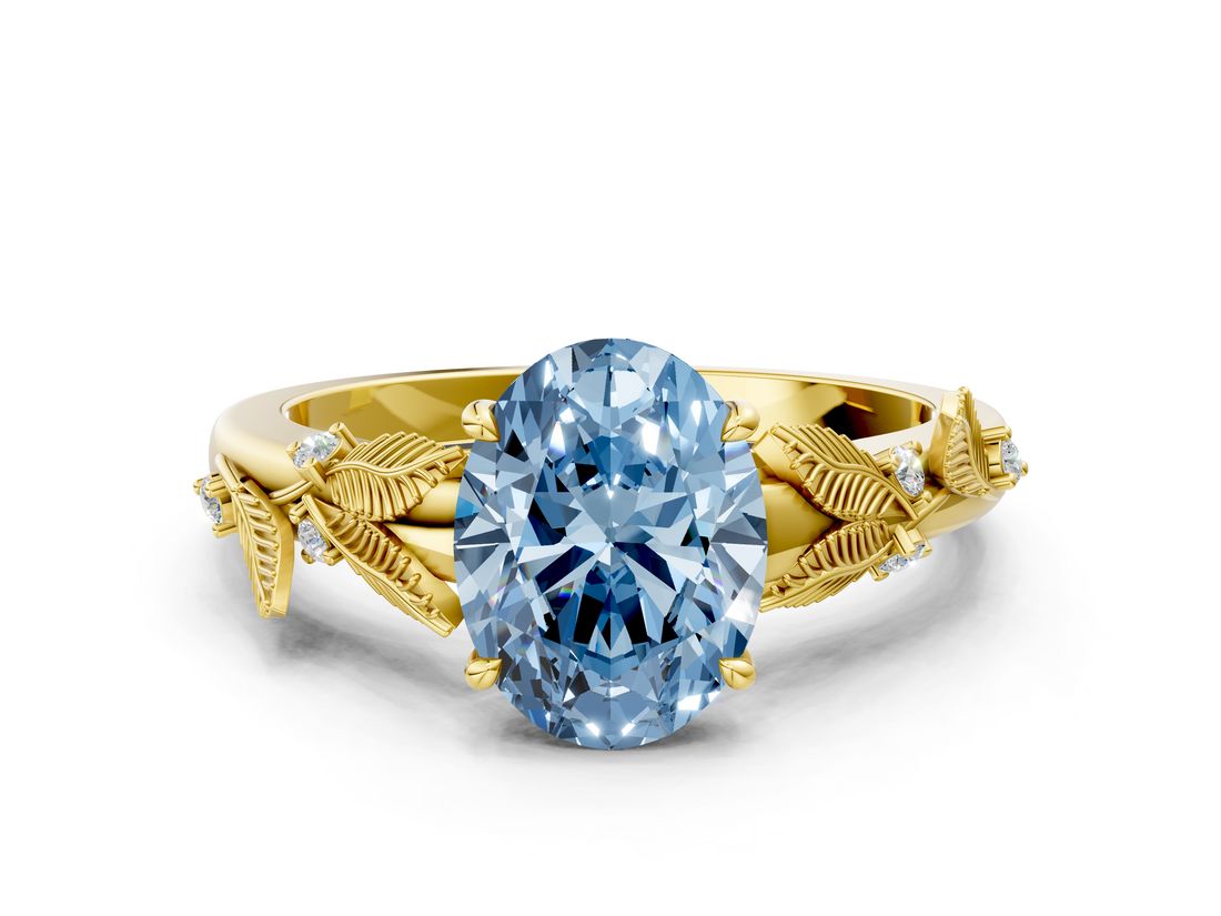 Yellow gold Fancy Blue Oval  Brilliant Solitaire with Leaf Motif Band and Four-Prong Setting_61