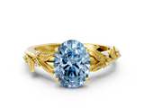 Yellow gold Fancy Blue Oval  Brilliant Solitaire with Leaf Motif Band and Four-Prong Setting_61