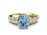 Yellow gold Fancy Blue Oval  Brilliant Solitaire with Side Stones on a Pave Band and Four-Prong Setting_24