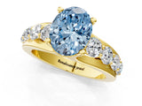 Yellow gold Fancy Blue Oval  Brilliant Solitaire with Side Stones on a Pave Band and Four-Prong Setting_25