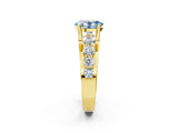 Yellow gold Fancy Blue Oval  Brilliant Solitaire with Side Stones on a Pave Band and Four-Prong Setting_26