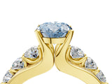 Yellow gold Fancy Blue Oval  Brilliant Solitaire with Side Stones on a Pave Band and Four-Prong Setting_28