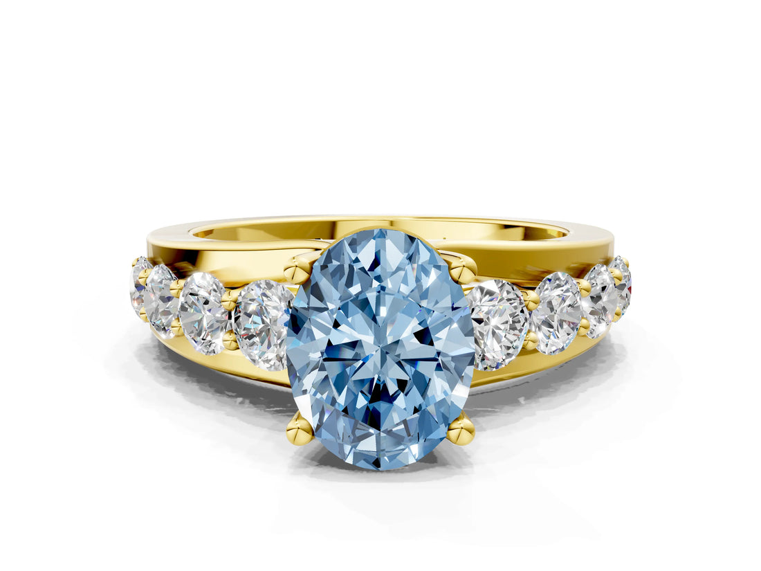 Yellow gold Fancy Blue Oval  Brilliant Solitaire with Side Stones on a Pave Band and Four-Prong Setting_37