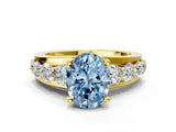 Yellow gold Fancy Blue Oval  Brilliant Solitaire with Side Stones on a Pave Band and Four-Prong Setting_37