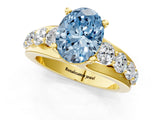Yellow gold Fancy Blue Oval  Brilliant Solitaire with Side Stones on a Pave Band and Four-Prong Setting_38