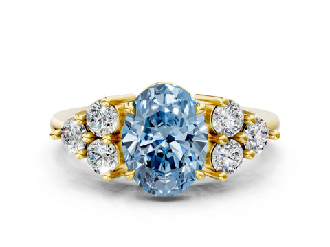 Yellow gold Fancy Blue Oval Cut Brilliant Diamond Cluster Accent Solitaire Ring with Prong Setting