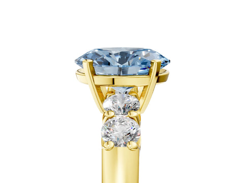 Yellow gold Fancy Blue Oval Cut Brilliant Diamond Five-Stone Engagement Ring with Prong Setting on a Classic Band_8