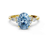 Yellow gold Fancy Blue Oval Cut Brilliant Diamond Solitaire Ring with Pear Side Stones and Four-Prong Setting_3