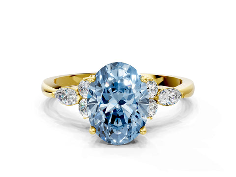 Yellow gold Fancy Blue Oval Cut Brilliant Diamond Solitaire Ring with Pear Side Stones and Four-Prong Setting_3