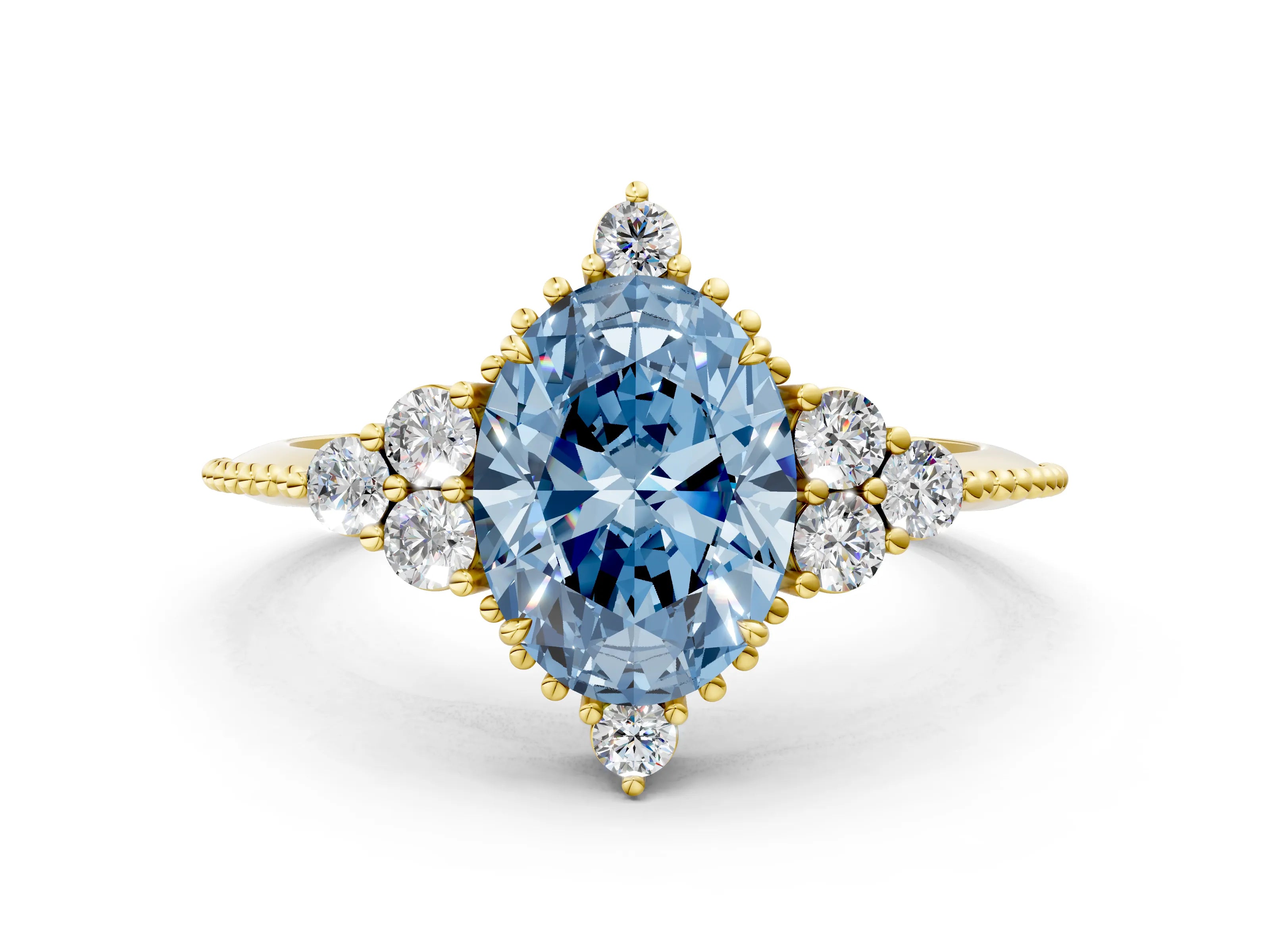 Yellow gold Fancy Blue Oval Cut Brilliant Diamond with Cluster Setting on a Beaded Band and Four-Prong Setting