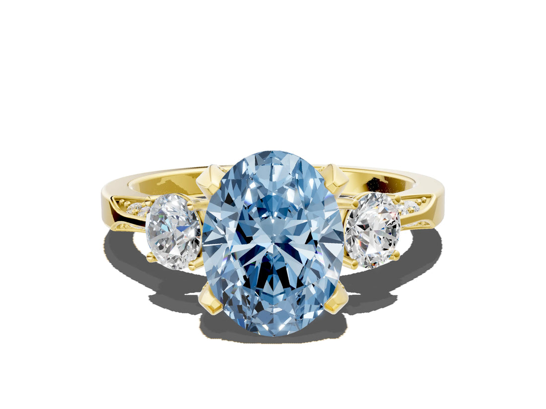 Yellow gold Fancy Blue Oval Cut Brilliant Three-Stone Diamond Ring with Pavé Band and Four-Prong Setting_3