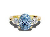 Yellow gold Fancy Blue Oval Cut Brilliant Three-Stone Diamond Ring with Pavé Band and Four-Prong Setting_3