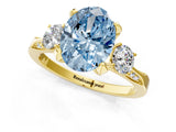 Yellow gold Fancy Blue Oval Cut Brilliant Three-Stone Diamond Ring with Pavé Band and Four-Prong Setting_4