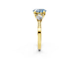 Yellow gold Fancy Blue Oval Cut Brilliant Three-Stone Diamond Ring with Pavé Band and Four-Prong Setting_5