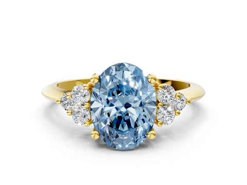 Yellow gold Fancy Blue Oval Cut Cut Diamond Cluster Ring with Solitaire Band and Four-Prong Setting