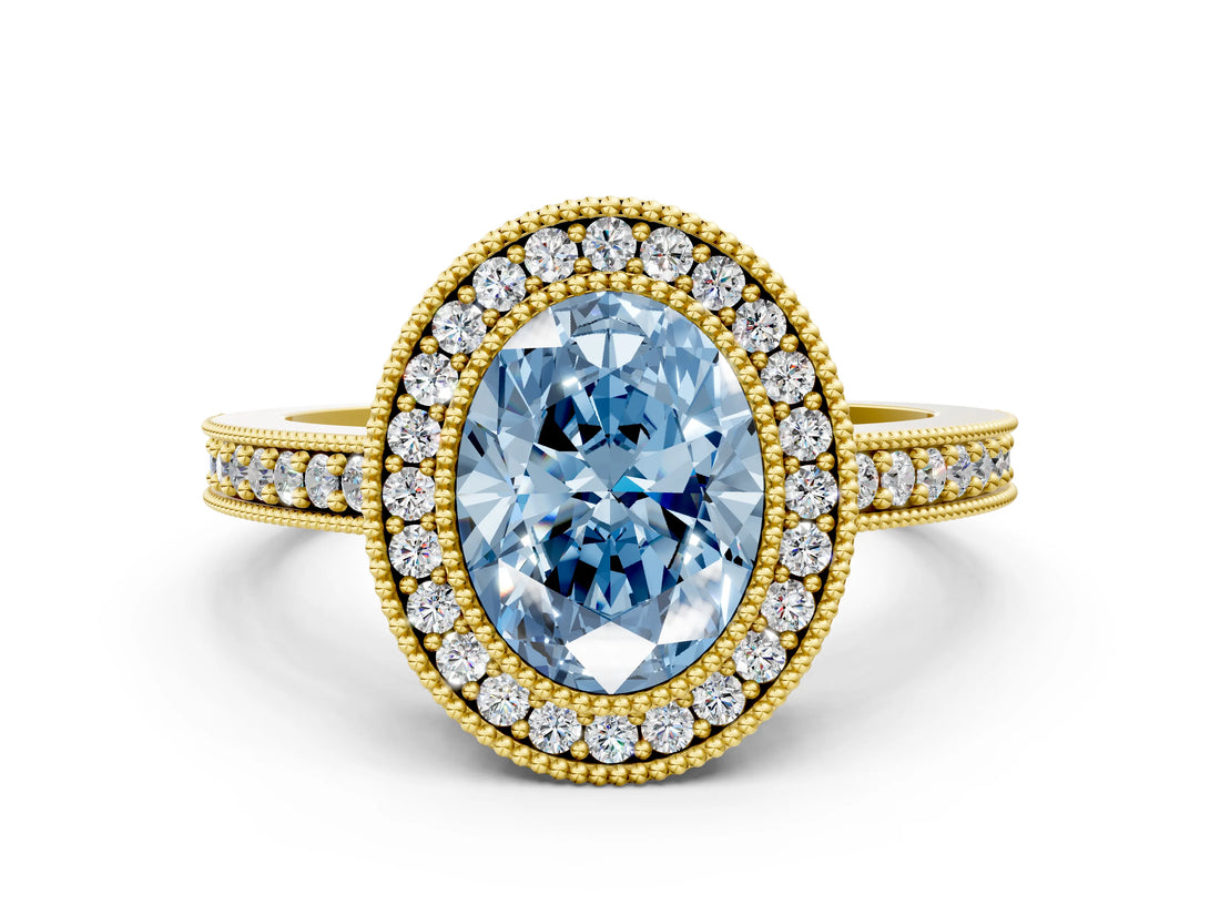 Yellow gold Fancy Blue Oval Cut-Cut Diamond Halo Engagement Ring with Pave Band and Prong Setting