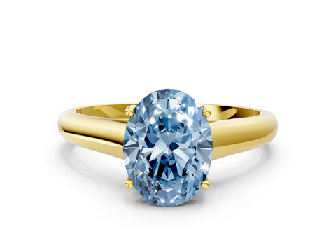 Yellow gold Fancy Blue Oval Cut Cut Diamond Solitaire Engagement Ring with Tapered Plain Band and Four-Prong Setting