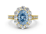 Yellow gold Fancy Blue Oval Cut Cut Halo Diamond Pavé Engagement Ring with Milgrain Detailing