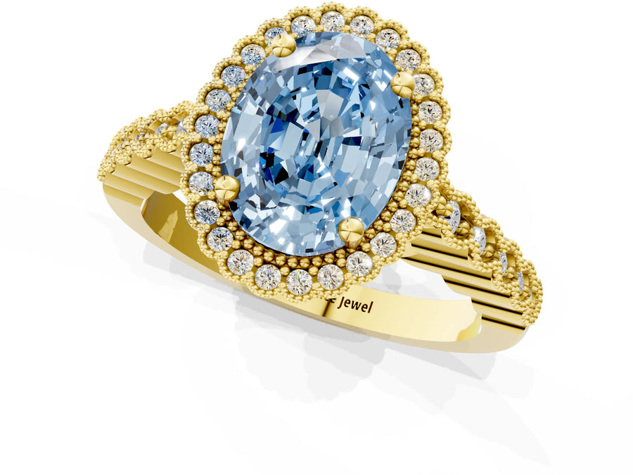 Yellow gold Fancy Blue Oval Cut Cut Halo Pavé Solitaire Ring with Milgrain Band