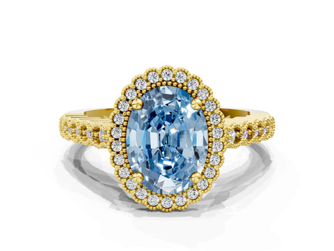 Yellow gold Fancy Blue Oval Cut Cut Halo Pavé Solitaire Ring with Milgrain Band