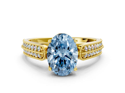 Yellow gold Fancy Blue Oval Cut Cut Pave Split Shank Engagement Ring with Four-Prong Setting