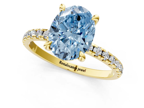 Yellow gold Fancy Blue Oval Cut Diamond Brilliant Solitaire Ring with Pavé Band and Four-Prong Setting