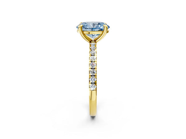 Yellow gold Fancy Blue Oval Cut Diamond Brilliant Solitaire Ring with Pavé Band and Four-Prong Setting