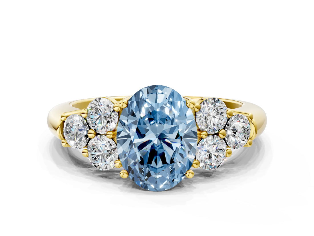 Yellow gold Fancy Blue Oval  Cut Diamond Cluster Ring with Round Accent Stones and Prong Setting on a Classic Band_49