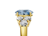 Yellow gold Fancy Blue Oval  Cut Diamond Cluster Ring with Round Accent Stones and Prong Setting on a Classic Band_54