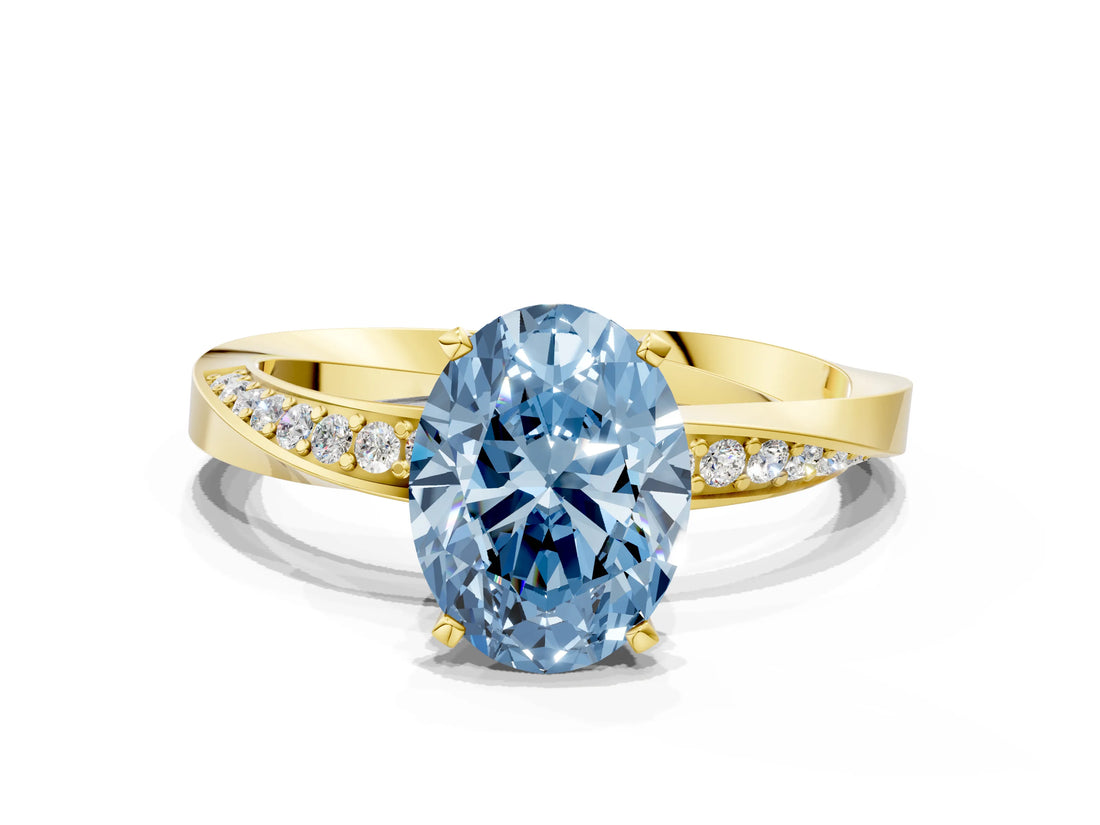 Yellow gold Fancy Blue Oval Cut Diamond Engagement Ring with Side Stone Accents and Four-Prong Setting_12