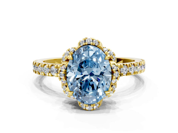 Yellow gold Fancy Blue Oval Cut Diamond Halo Pave Band with Four-Prong Setting
