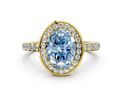 Yellow gold Fancy Blue Oval Cut Diamond Halo Ring with Bezel Frame and Pavé Band