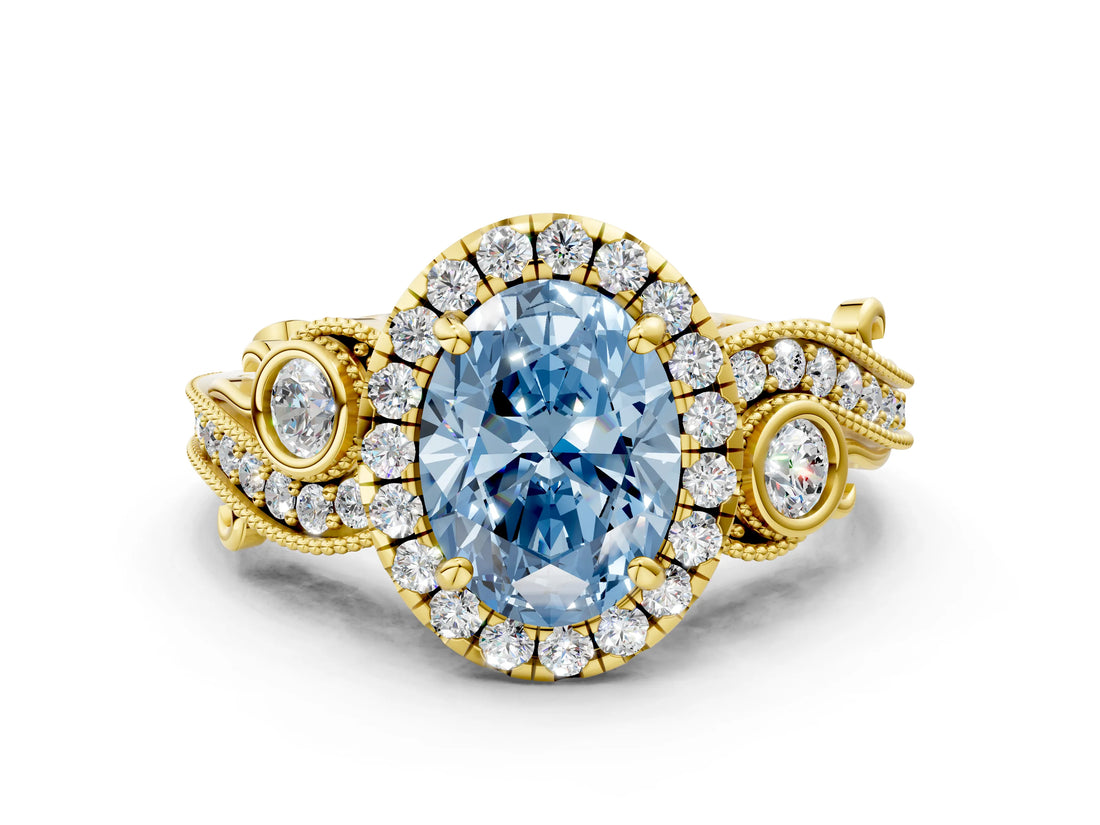 Yellow gold Fancy Blue Oval Cut Diamond Halo Ring with Milgrain Pavé Band and Four-Prong Setting_70