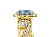 Yellow gold Fancy Blue Oval Cut Diamond Halo Ring with Milgrain Pavé Band and Four-Prong Setting_75