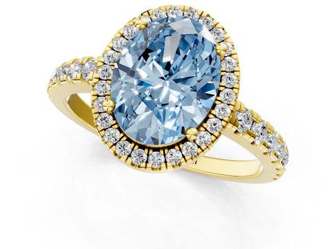 Yellow gold Fancy Blue Oval Cut Diamond Halo Ring with Pavé Band and Four-Prong Setting_1