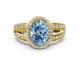 Yellow gold Fancy Blue Oval Cut Diamond Halo Ring with Split Shank Pavé Band and Four-Prong Setting