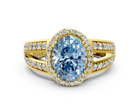 Yellow gold Fancy Blue Oval Cut Diamond Halo Ring with Split Shank Pavé Band and Four-Prong Setting
