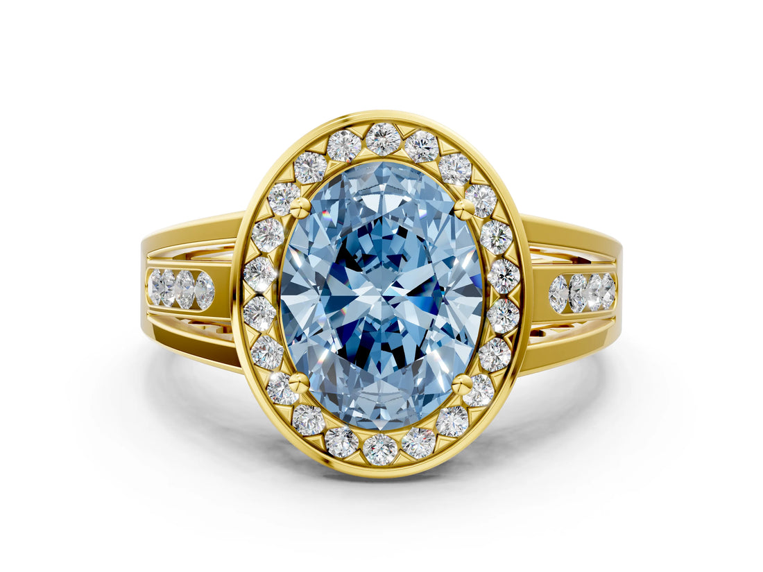 Yellow gold Fancy Blue Oval Cut Diamond Halo Ring with Split Shank and Bezel Accents and Prong Setting