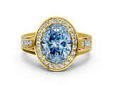 Yellow gold Fancy Blue Oval Cut Diamond Halo Ring with Split Shank and Bezel Accents and Prong Setting