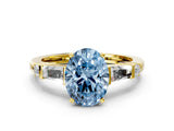 Yellow gold Fancy Blue Oval  Cut Diamond Ring with Baguette Side Stones, Channel Set Band, and Four-Prong Setting_24
