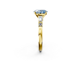 Yellow gold Fancy Blue Oval  Cut Diamond Ring with Baguette Side Stones, Channel Set Band, and Four-Prong Setting_5